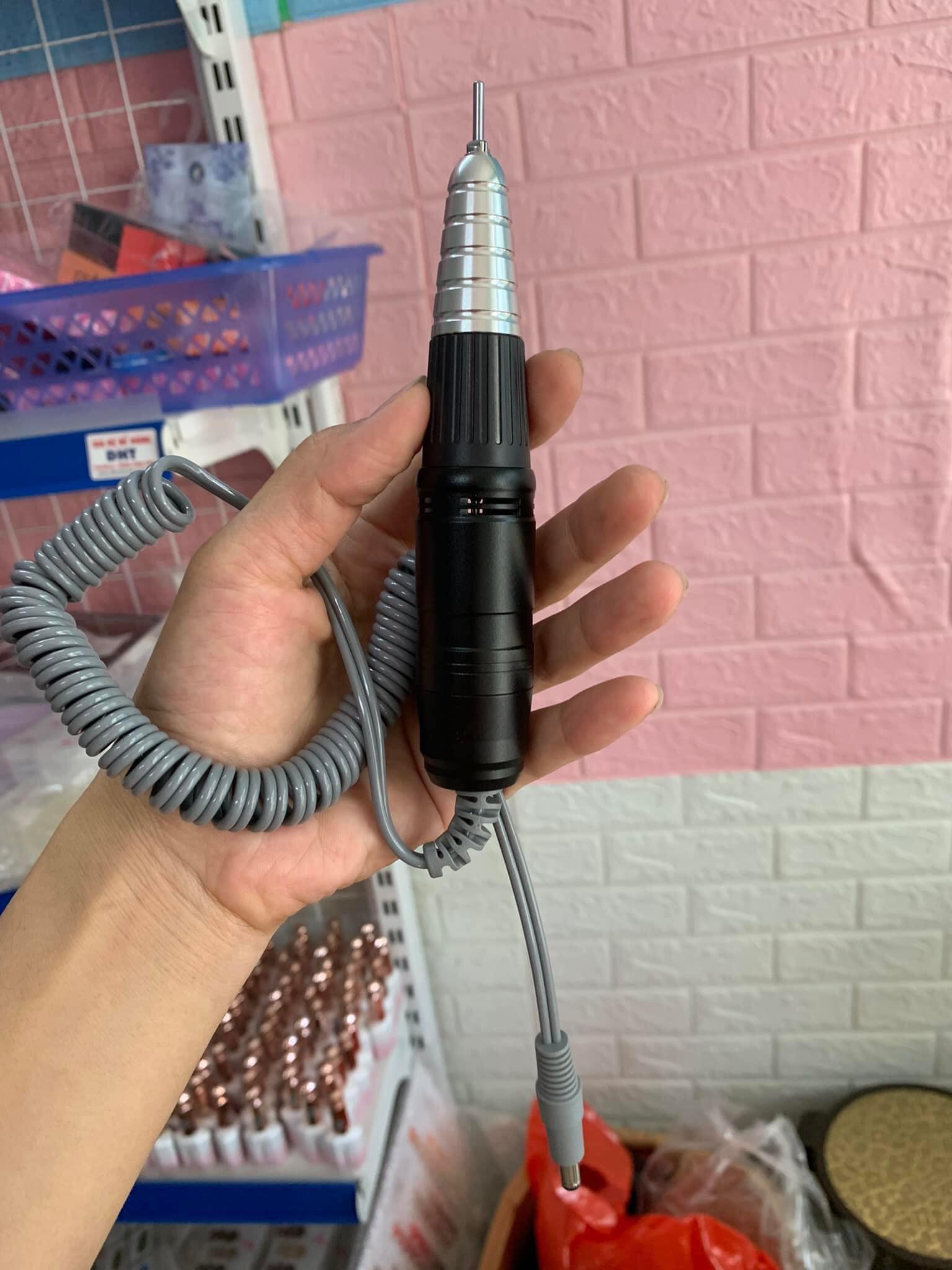 Tay cầm máy mài