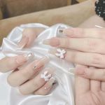 Charm nơ đen/ trắng